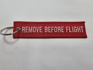 Llavero tela Remove Before Flight Rojo